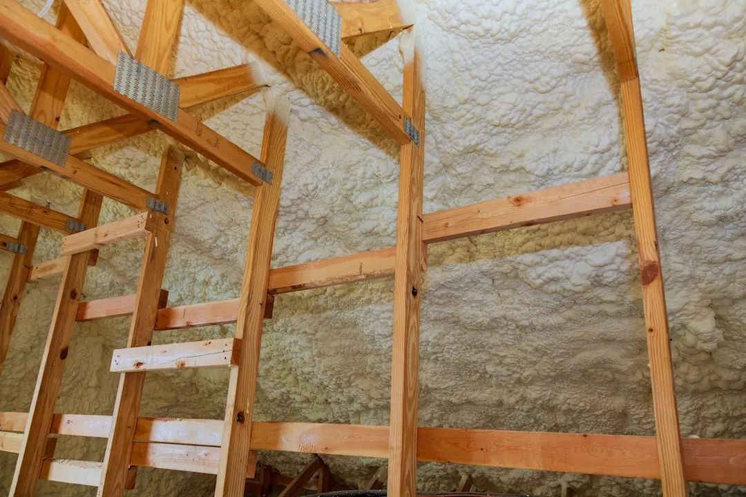 Residential wall insulation being installed